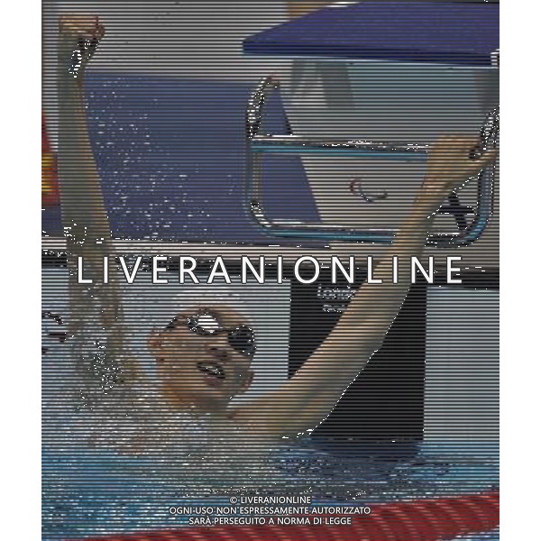 (120909) -- LONDON, Sept. 9, 2012 () -- Yang Bozun of China celebrates for victory after the men\'s 200m individual medley SM11 final of swimming competition at the London 2012 Paralympic Games in London, Britain, on Sept. 8, 2012. Yang won the gold medal and created the new world record with 2 minutes and 22.40 seconds. (/Yang Shiyao) (lm) PHOTOSHOT/AG ALDO LIVERANI SAS - ITALY ONLY -