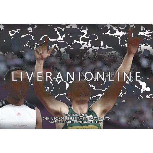(120909) -- LONDON, Sept. 9, 2012 () -- Fanie van der Merwe (R) of South Africa reacts after the men\'s 100m T37 final of athletics competition at the London 2012 Paralympic Games in London, Britain, on Sept. 8, 2012. (/Wang Lili) (lm) PHOTOSHOT/AG ALDO LIVERANI SAS - ITALY ONLY -