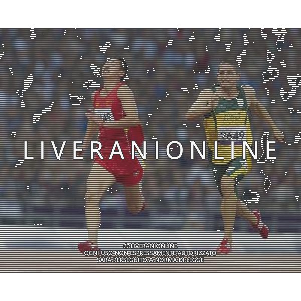 (120909) -- LONDON, Sept. 9, 2012 () -- Liang Yongbin (L) of China and Fanie van der Merwe of South Africa compete during the men\'s 100m T37 final of athletics competition at the London 2012 Paralympic Games in London, Britain, on Sept. 8, 2012. (/Yang Lei) (lm) PHOTOSHOT/AG ALDO LIVERANI SAS - ITALY ONLY -