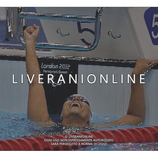 (120909) -- LONDON, Sept. 9, 2012 () -- Teresa Perales of Spain celebrates for victory after winning the women\'s 100m freestyle S5 final of swimming competition at the London 2012 Paralympic Games in London, Britain, on Sept. 8, 2012. Teresa Perales won the gold medal with 1 minute and 18.55 seconds. (/Yang Shiyao) (lm) PHOTOSHOT/AG ALDO LIVERANI SAS - ITALY ONLY -
