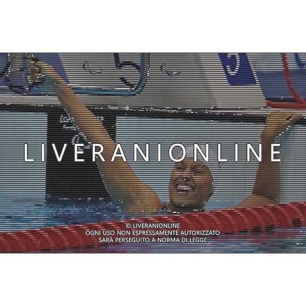 (120909) -- LONDON, Sept. 9, 2012 () -- Teresa Perales of Spain celebrates for victory after winning the women\'s 100m freestyle S5 final of swimming competition at the London 2012 Paralympic Games in London, Britain, on Sept. 8, 2012. Teresa Perales won the gold medal with 1 minute and 18.55 seconds. (/Yang Shiyao) (lm) PHOTOSHOT/AG ALDO LIVERANI SAS - ITALY ONLY -