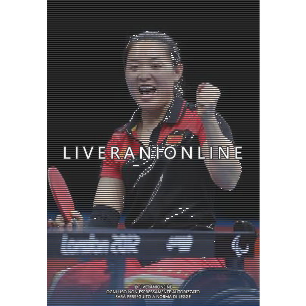 (120909) -- LONDON, Sept. 9, 2012 () -- Zhang Bian of China\'s team celebrates for score during the women\'s team class 4-5 gold medal match against Sweden of table tennis competition at the London 2012 Paralympic Games in London, Britain, on Sept. 8, 2012. China won 3-0 to win the gold medal. (/Bai Xuefei) (lm) PHOTOSHOT/AG ALDO LIVERANI SAS - ITALY ONLY -