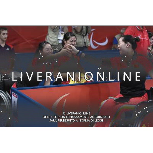 (120909) -- LONDON, Sept. 9, 2012 () -- Zhang Miao (1st R) and Zhang Bian (2nd L) of China\'s team celebrates for victory after the women\'s team class 4-5 gold medal match against Sweden of table tennis competition at the London 2012 Paralympic Games in London, Britain, on Sept. 8, 2012. China won 3-0 to win the gold medal. (/Bai Xuefei) (lm) PHOTOSHOT/AG ALDO LIVERANI SAS - ITALY ONLY -