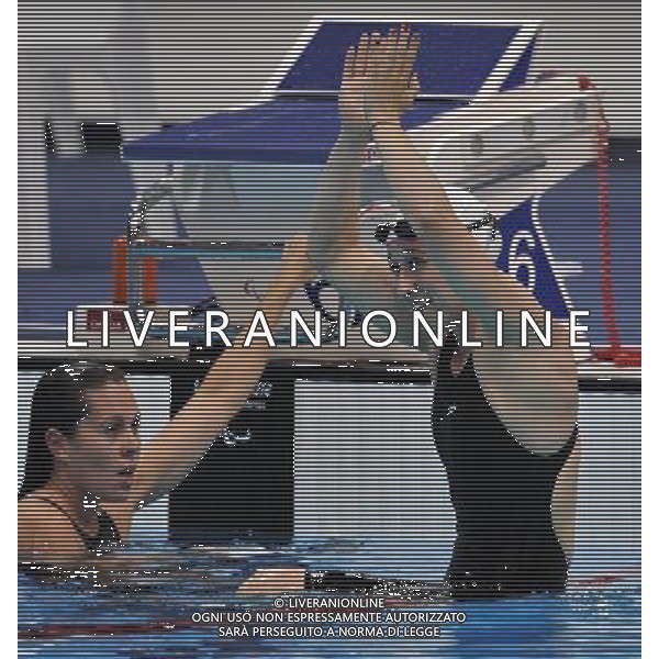 (120909) -- LONDON, Sept. 9, 2012 () -- Natali Pronina (R) of Azerbajian celebrates for victory after winning the women\'s 100m breaststroke SB12 final of swimming competition at the London 2012 Paralympic Games in London, Britain, on Sept. 8, 2012. Natali Pronina won the gold medal and created the new world record with 1 minute and 16.17 seconds. (/Yang Shiyao) (lm) PHOTOSHOT/AG ALDO LIVERANI SAS - ITALY ONLY -