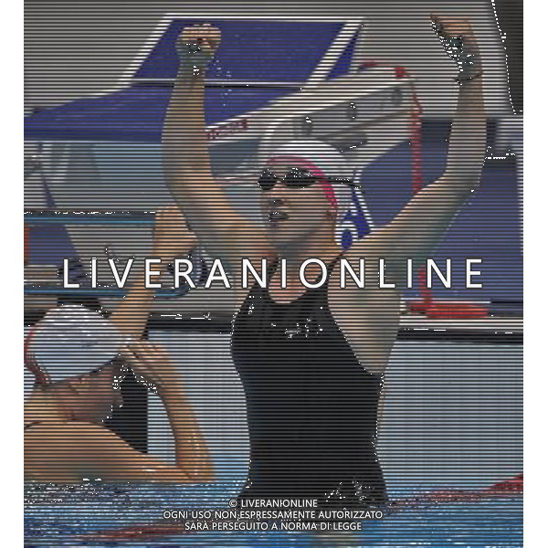 (120909) -- LONDON, Sept. 9, 2012 () -- Natali Pronina (R) of Azerbajian celebrates for victory after winning the women\'s 100m breaststroke SB12 final of swimming competition at the London 2012 Paralympic Games in London, Britain, on Sept. 8, 2012. Natali Pronina won the gold medal and created the new world record with 1 minute and 16.17 seconds. (/Yang Shiyao) (lm) PHOTOSHOT/AG ALDO LIVERANI SAS - ITALY ONLY -