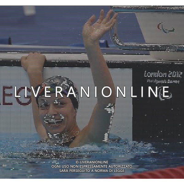 (120909) -- LONDON, Sept. 9, 2012 () -- Victoria Arlen of the United States celebrates for victory after winning the women\'s 100m freestyle S6 final of swimming competition at the London 2012 Paralympic Games in London, Britain, on Sept. 8, 2012. Victoria Arlen won the gold medal and created the new world record with 1 minute and 13.33 seconds. (/Yang Shiyao) (lm) PHOTOSHOT/AG ALDO LIVERANI SAS - ITALY ONLY -