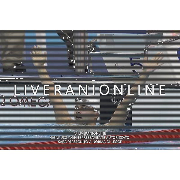 (120909) -- LONDON, Sept. 9, 2012 () -- Pavel Poltavtsev of Russia celebrates for victory after winning the men\'s 100m breaststroke SB9 final of swimming competition at the London 2012 Paralympic Games in London, Britain, on Sept. 8, 2012. Pavel Poltavtsev won the gold medal and created the new world record with 1 minute and 04.02 seconds. (/Wu Wei) (lm) PHOTOSHOT/AG ALDO LIVERANI SAS - ITALY ONLY -