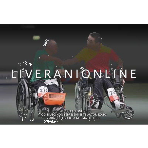 (120909) -- LONDON, Sept. 9, 2012 () -- Maciel Sousa Santos (L) of Brazil shakes hands with Yan Zhiqiang of China after their mixed individual BC2 final of boccia competition at the London 2012 Paralympic Games in London, Britain, on Sept. 9, 2012. Maciel Sousa Santos won 8-0 to win the gold. (/Hou Jun) (lm) PHOTOSHOT/AG ALDO LIVERANI SAS - ITALY ONLY -