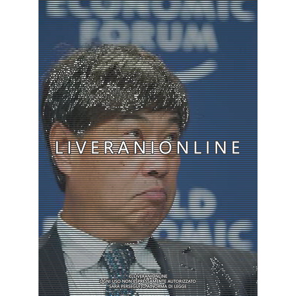 (120911) -- TIANJIN, Sept. 11, 2012 () -- Wang Bomin, editor-in-chief of Caijing Magzine, reacts at an interactive session titled \'The 7 Billion Challenge: What innovations are needed to meet the basic needs of a growing population\' during the World Economic Forum Annual Meeting of the New Champions 2012 in Tianjin, north China, Sept. 11, 2012. The Annual Meeting of the New Champions 2012 opened here on Tuesday with the theme of \'Creating the Future Economy\'.(/Yue Yuewei) (hdt) ©photoshot/AG ALDO LIVERANI SAS ITALY ONLY