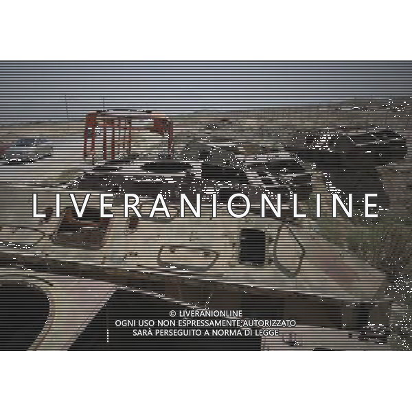 (120911) -- KABUL, Sept. 11, 2012 () -- Destroyed military tanks are seen near the TV mountain in Kabul, Afghanistan, Sept. 11, 2012. The TV mountain was one of the first targets where the U.S.-led international forces bombed Taliban in October 2001 in direct response to the attacks on U.S. soil on Sept. 11, 2001. (/Ahmad Massoud) (zyw) ©photoshot/AGENZIA ALDO LIVERANI SAS - ITALY ONLY - Vedute della citta\' di Kabul in Afghanistan, 11 settembre, 2012.