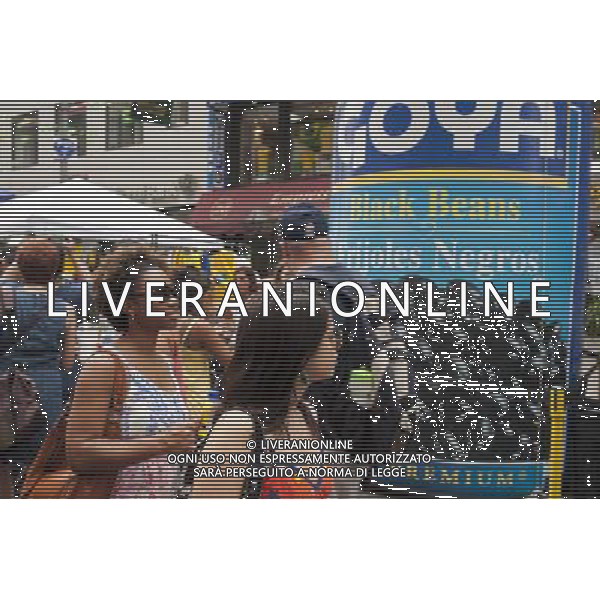 Brazilians and visitors pass a Goya foods display at the 28th Annual Brazil Day Festival in New York on Sunday, September 2, 2012. The festival, which features food. music and other aspects of Brazilian culture, centers around West 46th Street in Midtown Manhattan, known as Little Brazil. (å Richard B. Levine) photoshot/AG ALDO LIVERANI SAS - ITALY ONLY -