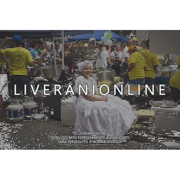 A food vendor at the 28th Annual Brazil Day Festival in New York on Sunday, September 2, 2012. The festival, which features food, music and other aspects of Brazilian culture, centers around West 46th Street in Midtown Manhattan, known as Little Brazil. (å Frances M. Roberts) photoshot/AG ALDO LIVERANI SAS - ITALY ONLY -