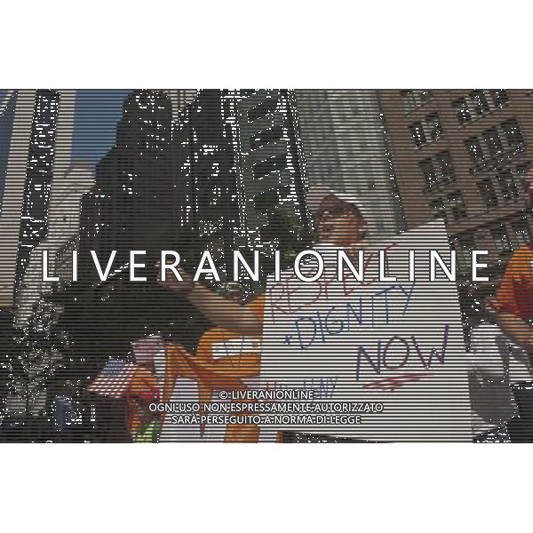 Activists, including some employees of companies owned by Bain Capital LLC, protest Republican Presidential Candidate Mitt Romney, in front of Bain\'s headquarters in New York on Thursday, August 30, 2012 prior to the Republicans nominating Romney at their convention. Romney served as CEO of Bain Capital LLC from 1984 to 1999. (å Richard B. Levine) photoshot/AG ALDO LIVERANI SAS - ITALY ONLY -