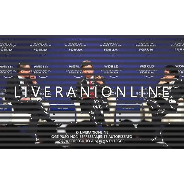 (120913) -- TIANJIN, Sept. 13, 2012 () -- Zhu Min (C), deputy managing director of International Monetary Fund (IMF), addresses an interactive session titled \'Asia Economic Outlook\' during the World Economic Forum Annual Meeting of the New Champions 2012 in Tianjin, north China, Sept. 13, 2012. (/Zhang Chaoqun) (cl) ©PHOTOSHOT/AGENZIA ALDO LIVERANI SAS - ITALY ONLY - Riunione del World Economic Forum annuale dei Nuovi Campioni 2012 a Tianjin, nel nord della Cina, 13 settembre, 2012.