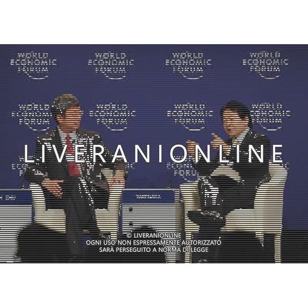(120913) -- TIANJIN, Sept. 13, 2012 () -- Heizo Takenaka (R), director of Global Security Research Institute of Keio University of Japan, addresses an interactive session titled \'Asia Economic Outlook\' during the World Economic Forum Annual Meeting of the New Champions 2012 in Tianjin, north China, Sept. 13, 2012. (/Zhang Chaoqun) (cl) ©photoshot/AGENZIA ALDO LIVERANI SAS - ITALY ONLY - EDITORIAL USE ONLY