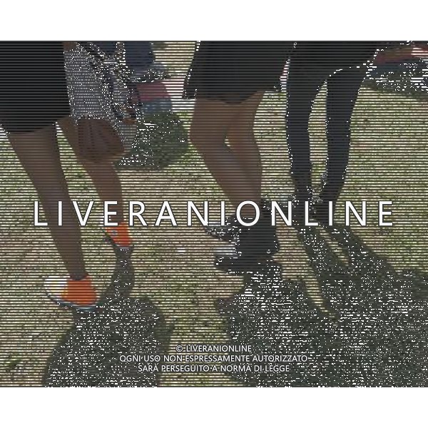 Visitors to the AfroPunk Festival in Commodore Barry Park in Brooklyn in New York on Sunday, August 26, 2012. The festival in the neighborhood of Fort Greene bills itself as the \'other black experience\' and blends the black punk and hardcore punk scenes. There is also a diverse aspect combining other minority groups, all dressed in their fashionable punk ensembles. (å Richard B. Levine) ©photoshot/AGENZIA ALDO LIVERANI SAS - ITALY ONLY - EDITORIAL USE ONLY