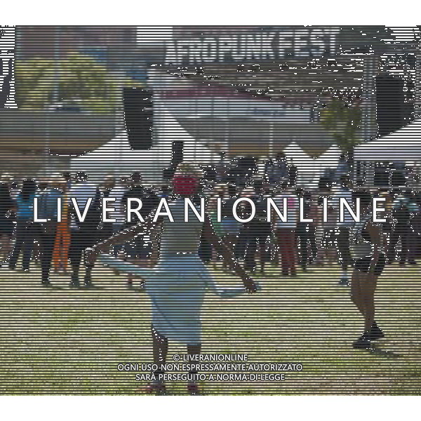 Visitors to the AfroPunk Festival in Commodore Barry Park in Brooklyn in New York on Sunday, August 26, 2012. The festival in the neighborhood of Fort Greene bills itself as the \'other black experience\' and blends the black punk and hardcore punk scenes. There is also a diverse aspect combining other minority groups, all dressed in their fashionable punk ensembles. (å Richard B. Levine) ©photoshot/AGENZIA ALDO LIVERANI SAS - ITALY ONLY - EDITORIAL USE ONLY