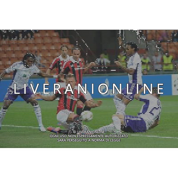 UEFA Champions League - 1Á giornata fase a gironi Gruppo C Milano 18-09-2012 Milan - Anderlecht nella foto: ignazio Abate sbroglia una situazione difficile sottoporta foto Roberto Garavaglia - ag. Aldo Liverani sas