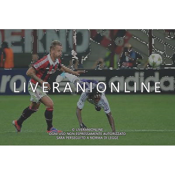 UEFA Champions League - 1Á giornata fase a gironi Gruppo C Milano 18-09-2012 Milan - Anderlecht nella foto: Mexes ferma Mbokani foto Roberto Garavaglia - ag. Aldo Liverani sas