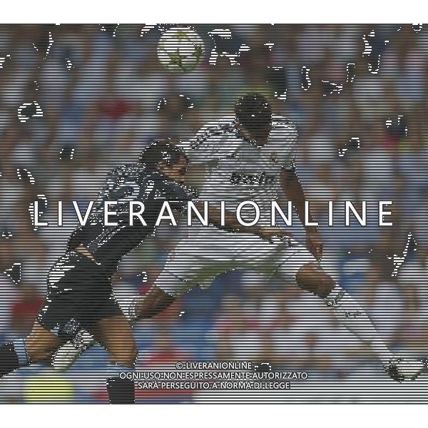 Real Madrid\'s Varane and Manchester City\'s Carlos Tevez during Champions League match on september 18th 2012. Photo: Cesar Cebola / ALFAQUI /Agenzia Aldo Liverani Sas - ITALY ONLY - EDITORIAL USE ONLY REAL MADRID - MANCHESTER CITY CHAMPIONS LEAGUE 18/09/2012