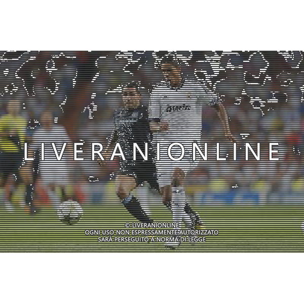 Real Madrid\'s Varane and Manchester City\'s Carlos Tevez during Champions League match on september 18th 2012. Photo: Cesar Cebola / ALFAQUI /Agenzia Aldo Liverani Sas - ITALY ONLY - EDITORIAL USE ONLY REAL MADRID - MANCHESTER CITY CHAMPIONS LEAGUE 18/09/2012