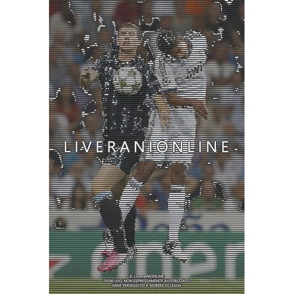 Real Madrid\'s Varane and Manchester City\'s Dzeko during Champions League match on september 18th 2012. Photo: Cesar Cebola / ALFAQUI /AGENZIA ALDO LIVERANI SAS - ITALY ONLY - EDITORIAL USE ONLY REAL MADRID - MANCHESTER CITY CHAMPIONS LEAGUE 18/09/2012