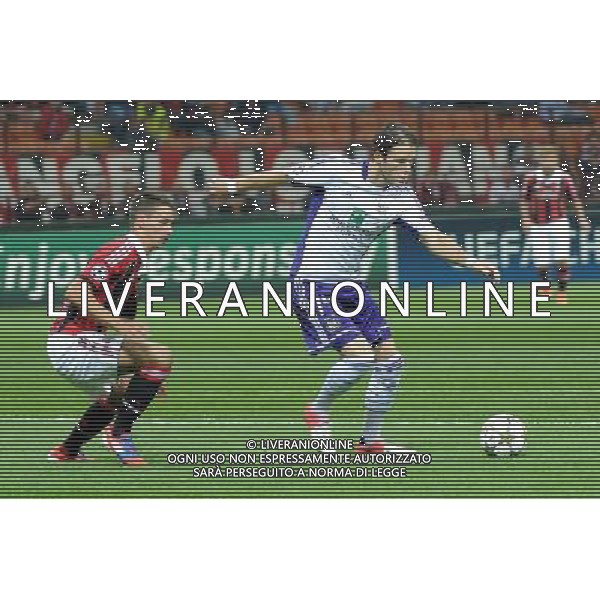 UEFA Champions League - 1Á giornata fase a gironi Gruppo C Milano 18-09-2012 Milan - Anderlecht nella foto: Bram Nuytinck (Anderlecht) e sulla SX Matteo De Sciglio (Milan) foto Roberto Garavaglia - ag. Aldo Liverani sas
