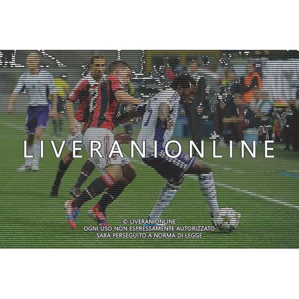 UEFA Champions League - 1Á giornata fase a gironi Gruppo C Milano 18-09-2012 Milan - Anderlecht nella foto: Dieudonne Mbokani (Anderlecht) e sulla SX Matteo De Sciglio (Milan) foto Roberto Garavaglia - ag. Aldo Liverani sas