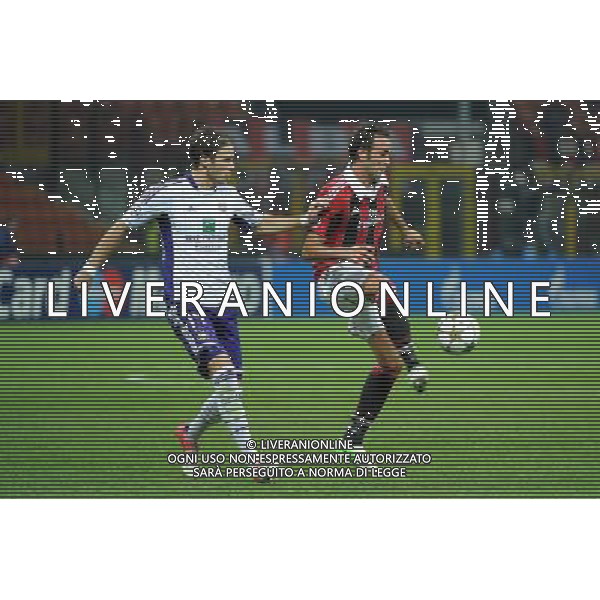 UEFA Champions League - 1Á giornata fase a gironi Gruppo C Milano 18-09-2012 Milan - Anderlecht nella foto: Giampaolo Pazzini (Milan) e sulla SX Bram Nuytinck (Anderlecht) foto Roberto Garavaglia - ag. Aldo Liverani sas