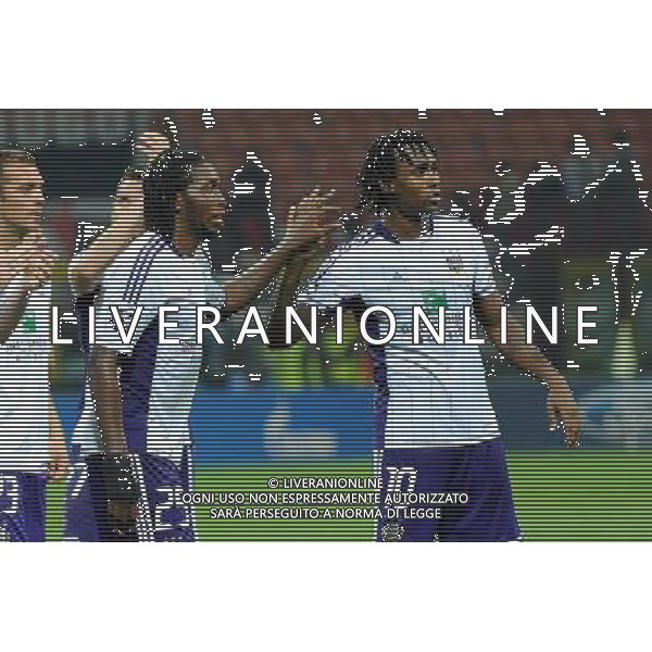 UEFA Champions League - 1Á giornata fase a gironi Gruppo C Milano 18-09-2012 Milan - Anderlecht nella foto: Dieudonne Mbokani (Anderlecht) a SX e Kanu (Anderlecht) foto Roberto Garavaglia - ag. Aldo Liverani sas