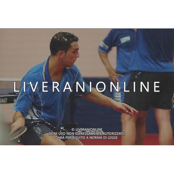 Senigallia, 01 / 08 / 2004 Pre - Olimpiadi di Atene 2004 Nazionale Maschile di Tennis Tavolo Nella foto: Massimiliano Mondello ph Simone Rosa / Aldo Liverani