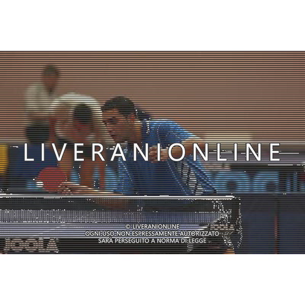 Senigallia, 01 / 08 / 2004 Pre - Olimpiadi di Atene 2004 Nazionale Maschile di Tennis Tavolo Nella foto: Massimiliano Mondello ph Simone Rosa / Aldo Liverani