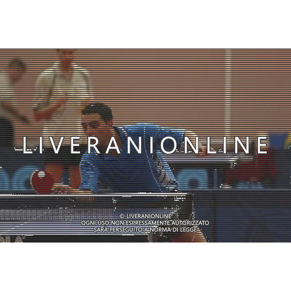 Senigallia, 01 / 08 / 2004 Pre - Olimpiadi di Atene 2004 Nazionale Maschile di Tennis Tavolo Nella foto: Massimiliano Mondello ph Simone Rosa / Aldo Liverani