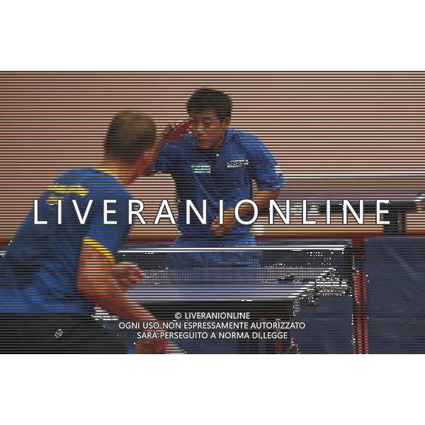 Senigallia, 01 / 08 / 2004 Pre - Olimpiadi di Atene 2004 Nazionale Maschile di Tennis Tavolo Nella foto: Yang Min ph Simone Rosa / Aldo Liverani