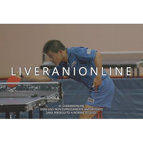 Senigallia, 01 / 08 / 2004 Pre - Olimpiadi di Atene 2004 Nazionale Maschile di Tennis Tavolo Nella foto: Yang Min ph Simone Rosa / Aldo Liverani