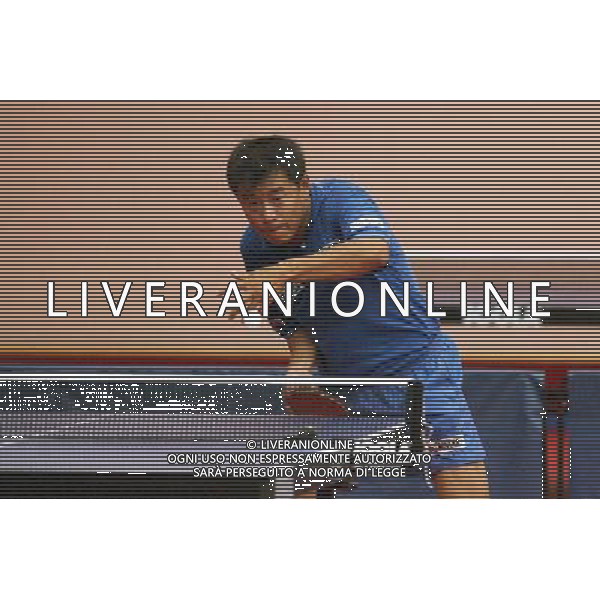 Senigallia, 01 / 08 / 2004 Pre - Olimpiadi di Atene 2004 Nazionale Maschile di Tennis Tavolo Nella foto: Yang Min ph Simone Rosa / Aldo Liverani