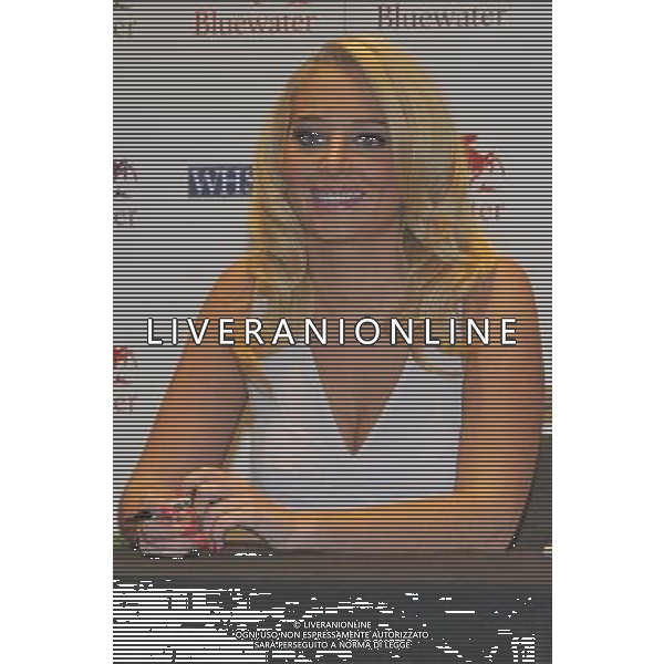 X Factor Star and Singer Tulisa (Tula Contostavlos) at a signing of her new book \'Honest - My Story So Far\' at WH Smith, Bluewater Shopping Centre, Greenhithe, Kent on Wednesday 26 September 2012. AG ALDO LIVERANI S A S ONLY ITALY