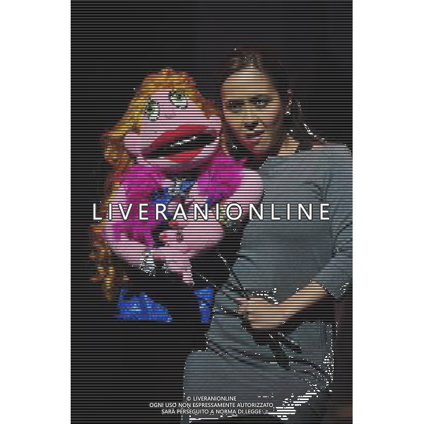 (120927) -- SINGAPORE, Sept. 27, 2012 () -- An actress performs during the premiere of Broadway musical \'Avenue Q\' at the Marina Bay Sands theatre in Singapore, Sept. 27, 2012. (/Then Chih Wey) (nxl) /Agenzia Aldo Liverani sas/ITALY ONLY - EDITORIAL USE ONLY