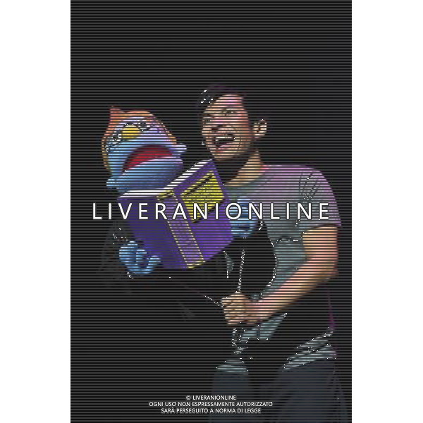 (120927) -- SINGAPORE, Sept. 27, 2012 () -- An actor performs during the premiere of Broadway musical \'Avenue Q\' at the Marina Bay Sands theatre in Singapore, Sept. 27, 2012. (/Then Chih Wey) (nxl) /Agenzia Aldo Liverani sas/ITALY ONLY - EDITORIAL USE ONLY