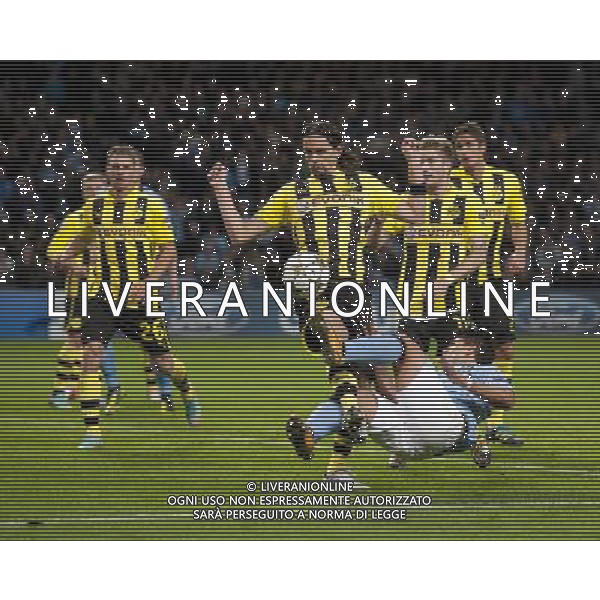 Borussia Dortmund\'s Neven Subotic concedes a late penalty when thisshor from Manchester City\'s Sergio Aguero strikes his arm Football - UEFA Champions League Group D - Manchester City v Borussia Dortmund - Wednesday 3rd October 2012 - Etihad Stadium - Manchester å© CameraSport - 43 Linden Ave. Countesthorpe. Leicester. England. LE8 5PG - Tel: +44 (0) 116 277 4147 - admin@camerasport.com - www.camerasport.com AG ALDO LIVERANI S A S ONLY ITALY