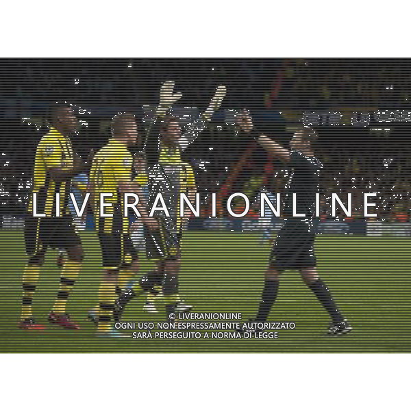 Referee Pavel Kralovec (CZE) waves away the protests from Borussia Dortmund players after awarding Manchester City a late penalty for handball Football - UEFA Champions League Group D - Manchester City v Borussia Dortmund - Wednesday 3rd October 2012 - Etihad Stadium - Manchester å© CameraSport - 43 Linden Ave. Countesthorpe. Leicester. England. LE8 5PG - Tel: +44 (0) 116 277 4147 - admin@camerasport.com - www.camerasport.com AG ALDO LIVERANI S A S ONLY ITALY