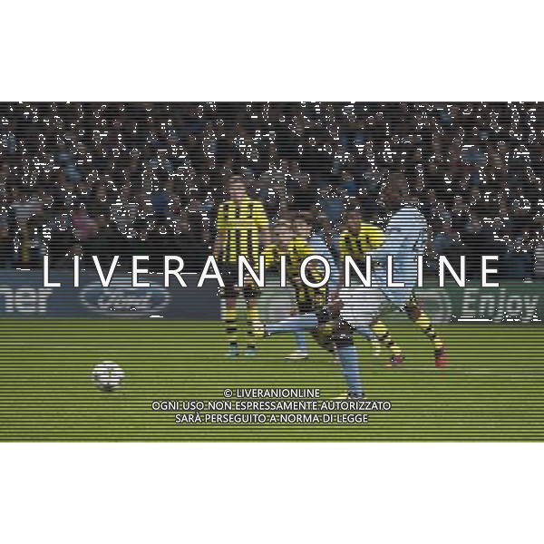 Manchester City\'s Mario Balotelli scores a late penalty to salvage a 1-1 draw Football - UEFA Champions League Group D - Manchester City v Borussia Dortmund - Wednesday 3rd October 2012 - Etihad Stadium - Manchester å© CameraSport - 43 Linden Ave. Countesthorpe. Leicester. England. LE8 5PG - Tel: +44 (0) 116 277 4147 - admin@camerasport.com - www.camerasport.com AG ALDO LIVERANI S A S ONLY ITALY