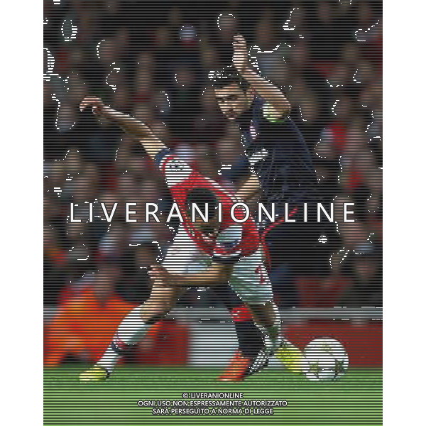 Arsenal\'s Francis Coquelin battles with Olympiakos\' Giannis Maniatis Football - UEFA Champions League Group B - Arsenal v Olympiakos FC - Wednesday 3rd October 2012 - Emirates Stadium - London © CameraSport - 43 Linden Ave. Countesthorpe. Leicester. England. LE8 5PG - Tel: +44 (0) 116 277 4147 - admin@camerasport.com - www.camerasport.com AG ALDO LIVERANI S A S ONLY ITALY