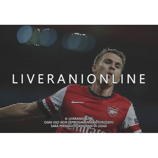 (121004) -- LONDON, Oct. 4, 2012 () -- Aaron Ramsey of Arsenal celebrates scoring Arsenal\'s 3rd goal during the UEFA Champions League Group B match between Arsenal FC and Olympiacos FC at the Emirates Stadium in London, Britain on Oct. 3, 2012. Arsenal won 3-1. (/Wang Lili) ©PHOTOSHOT/AGENZIA ALDO LIVERANI SAS - ITALY ONLY - EDITORIAL USE ONLY