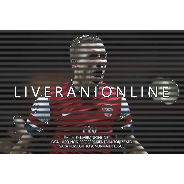 (121004) -- LONDON, Oct. 4, 2012 () -- Lukas Podolski of Arsenal celebrates scoring Arsenal\'s 2nd goal during the UEFA Champions League Group B match between Arsenal FC and Olympiacos FC at the Emirates Stadium in London, Britain on Oct. 3, 2012. Arsenal won 3-1. (/Wang Lili) ©PHOTOSHOT/AGENZIA ALDO LIVERANI SAS - ITALY ONLY - EDITORIAL USE ONLY