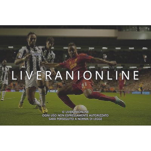 Liverpool\'s Raheem Sterling crosses under pressure from Udinese\'s Medhi Benatia Football - UEFA Europa League Group A - Liverpool v Udinese - Thursday 4th October 2012 - Anfield - Liverpool - å© CameraSport - 43 Linden Ave. Countesthorpe. Leicester. England. LE8 5PG - Tel: +44 (0) 116 277 4147 - admin@camerasport.com - www.camerasport.co AG ALDO LIVERANI S A S ONLY ITALY