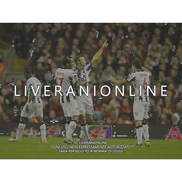 Udinese\'s Giovanni Pasquale celebrates scoring his sides third goal with team-mate Medhi Benatia (L) and Marco Davide Faraoni (R) Football - UEFA Europa League Group A - Liverpool v Udinese - Thursday 4th October 2012 - Anfield - Liverpool - å© CameraSport - 43 Linden Ave. Countesthorpe. Leicester. England. LE8 5PG - Tel: +44 (0) 116 277 4147 - admin@camerasport.com - www.camerasport.co AG ALDO LIVERANI S A S ONLY ITALY