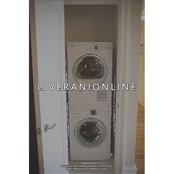 A washing machine and dryer squeezed into a closet in an apartment in New York is seen on Saturday, October 6, 2012. (å Richard B. Levine) ©photoshot/AGENZIA ALDO LIVERANI SAS - ITALY ONLY - EDITORIAL USE ONLY