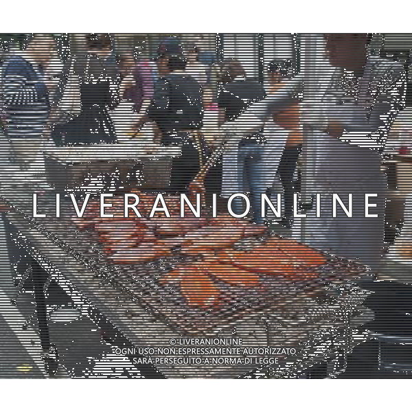 BBQ squid grilled at a street fair in Koreatown on West 32nd street in New York after the Korean Parade on Saturday, October 6, 2012. (å Richard B. Levine) ©photoshot/AGENZIA ALDO LIVERANI SAS - ITALY ONLY - EDITORIAL USE ONLY