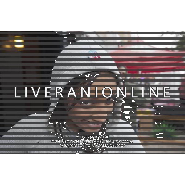 Jennifer Martinez shows off her election button supporting voter registration. VotoLatino organizes a voter registration block fair on Dyckman Street in the Inwood neighborhood of New York on Sunday, October 7, 2012, 2012. The voting block of Hispanics has become increasingly important in both local and national elections.(å Richard B. Levine) ©photoshot/AGENZIA ALDO LIVERANI SAS - ITALY ONLY - EDITORIAL USE ONLY